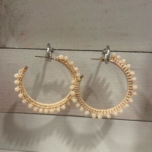 Gorgeous pink hoops with small pink jewels knitted around the entire edge